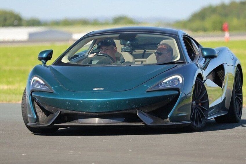 A sports car on a track. 2