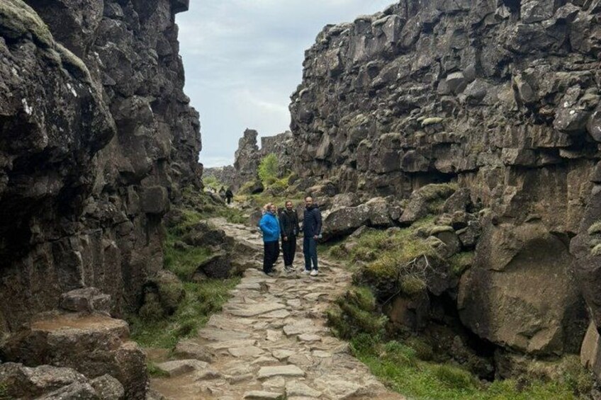 A narrow stone path between rocky cliffs. 2