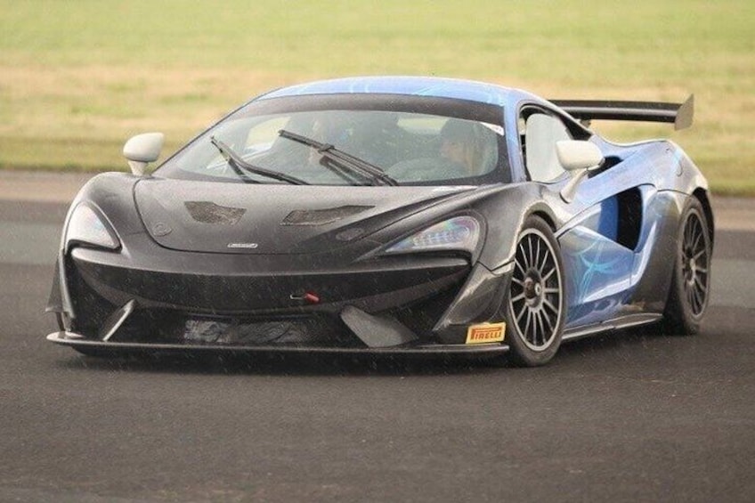 A sports car on a racetrack. 3