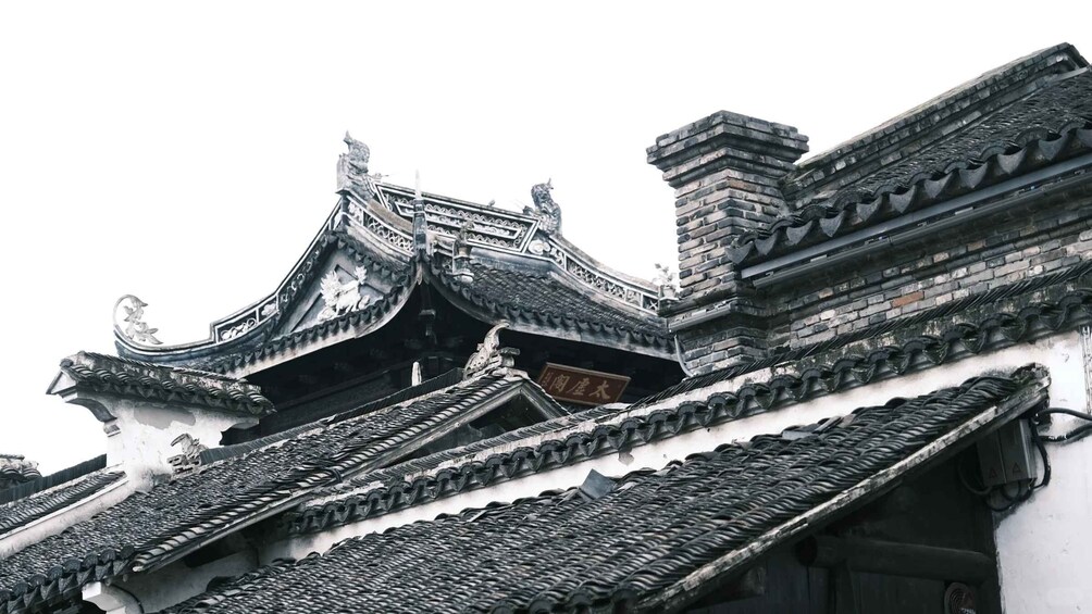 Traditional Chinese architecture with ornate roofs and intricate designs. 3