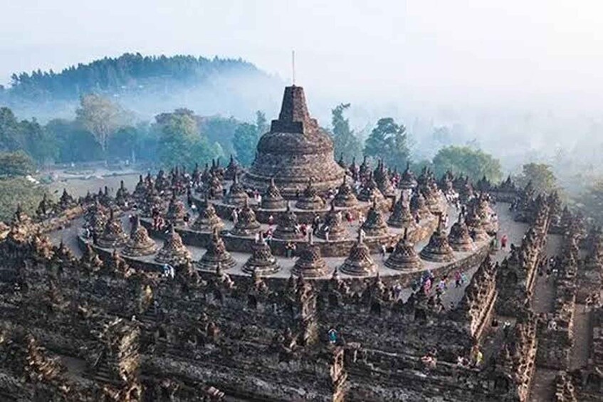 A large temple complex with multiple concentric structures and a central tower. 5