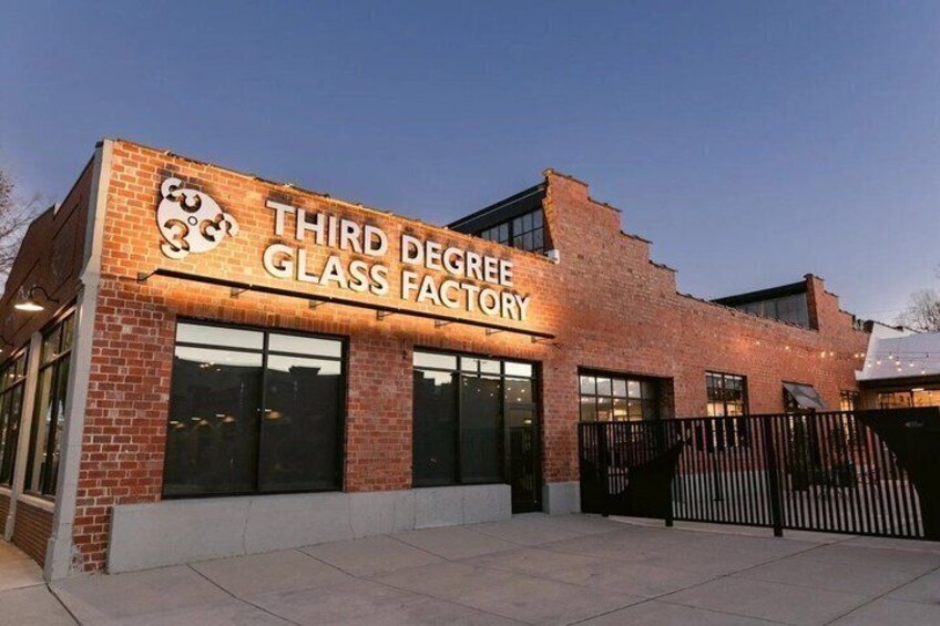 A building with a sign that reads 'THIRD DEGREE GLASS FACTORY'. 4