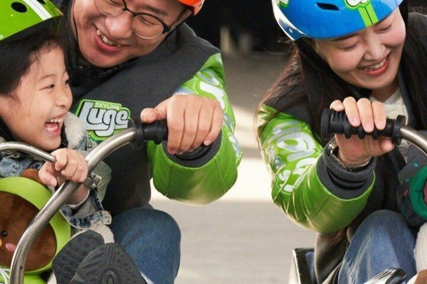 People riding a tandem bicycle. 2