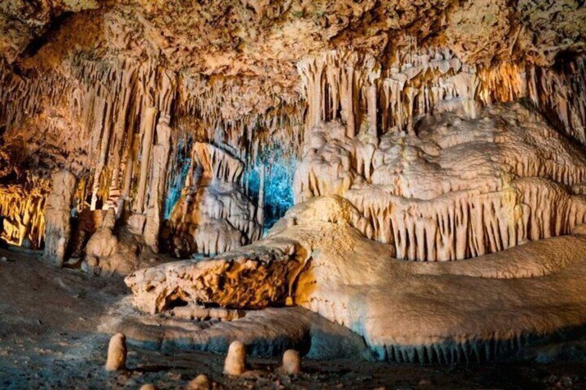 A cave with stalactites and stalagmites. 4