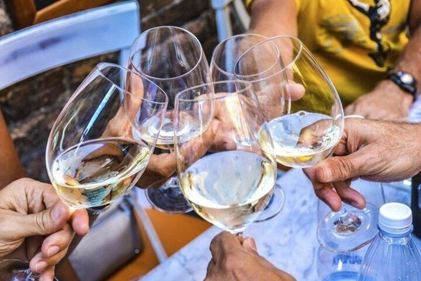 People holding wine glasses. 2