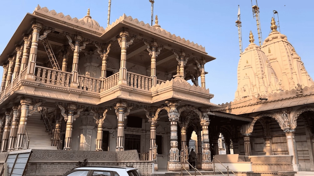 A temple with intricate carvings and a large dome. 3