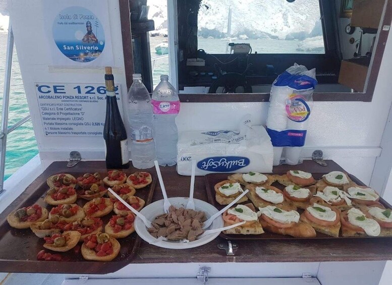 A boat with food items and a certificate on the side. 4