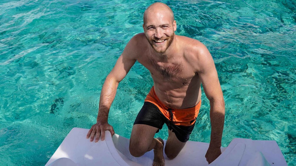 A man in a swimming pool. 2