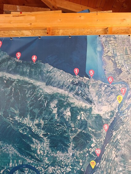 A satellite map with numbered markers indicating specific locations. 2