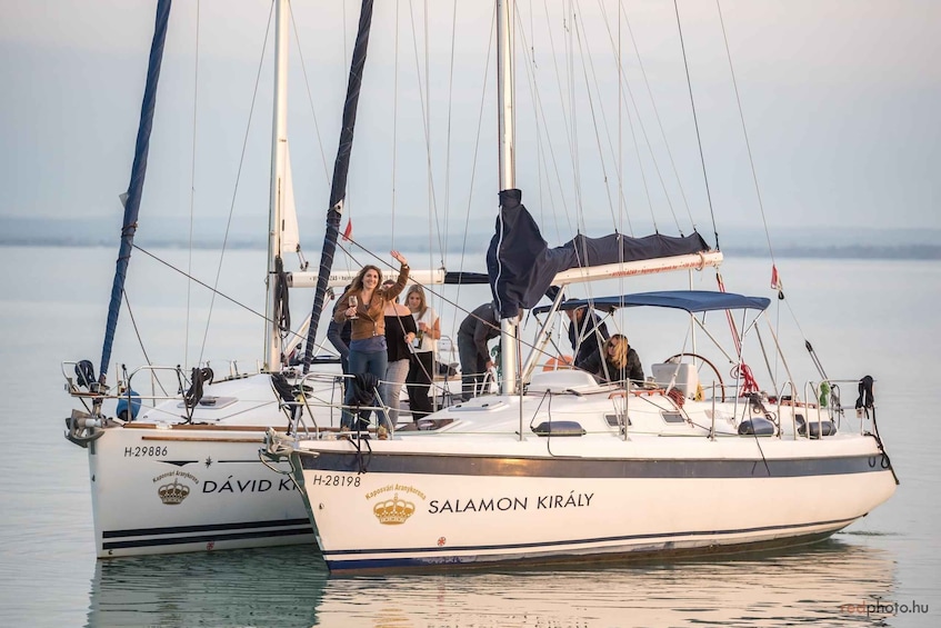 Two sailboats named DAVID KIRÁLY and SALAMON KIRÁLY docked at a marina. 2