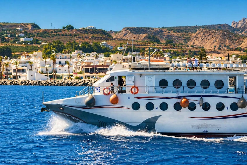 A speedboat with multiple lifebuoys and a person on the deck, moving through a coastal area with houses and hills in the background. 1