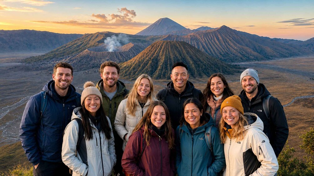 A group of people standing in front of a mountain with a volcano in the background. 2