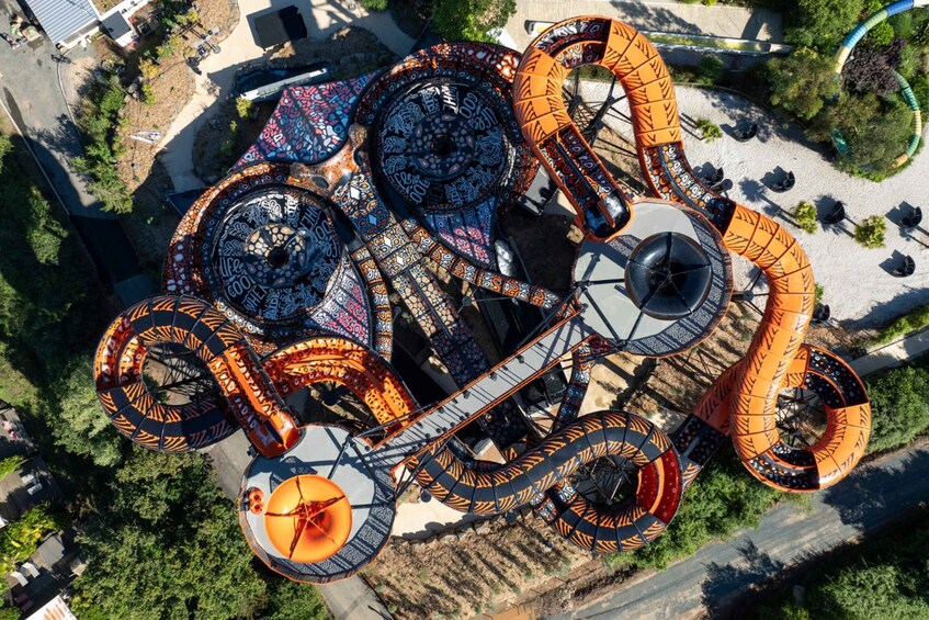 A complex water ride with multiple spinning and twisting water features. 3