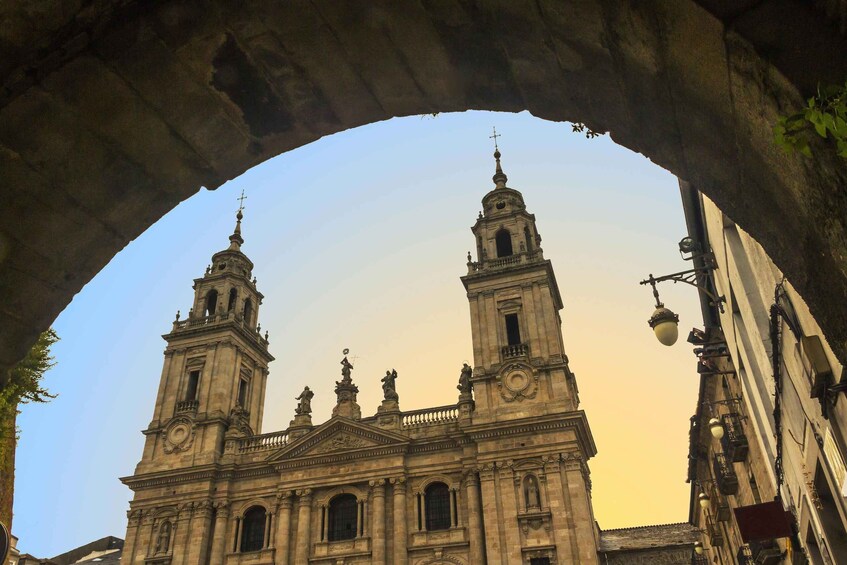 A historic cathedral with two prominent towers and a large arched entrance. 3