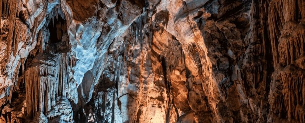 A cave with stalactites and stalagmites. 2