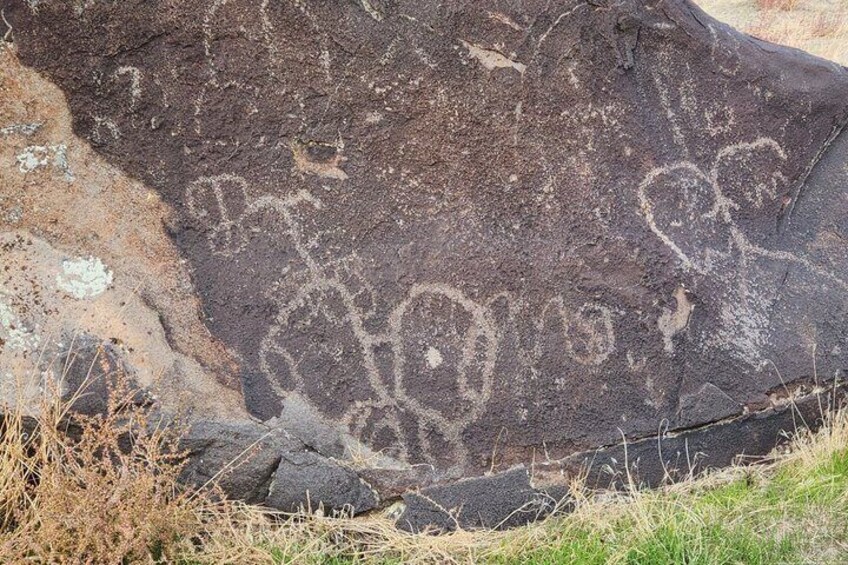 A rock with ancient petroglyphs. 3