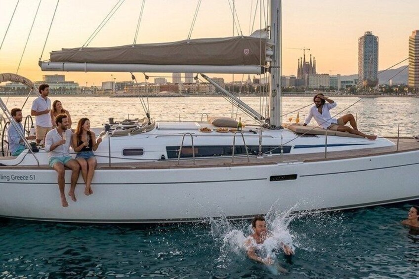 A sailboat with people on deck, a city skyline in the background, and a person swimming in the water. 3