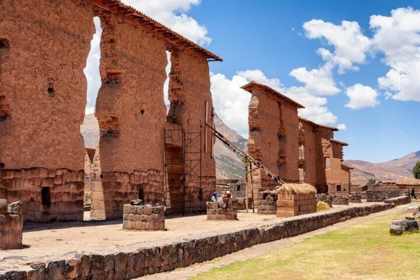 Ancient ruins with stone walls and a clear sky. 3