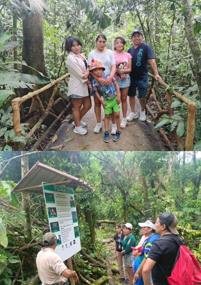 A group of people standing on a wooden bridge in a forested area with a signboard about flora. 5