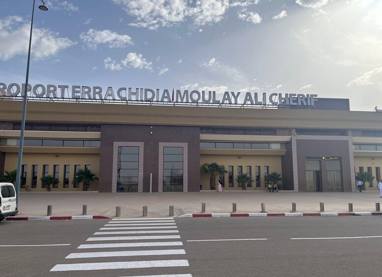 A building with a sign reading 'Port of Ferrachidia Moulay Al Cheref'. 2