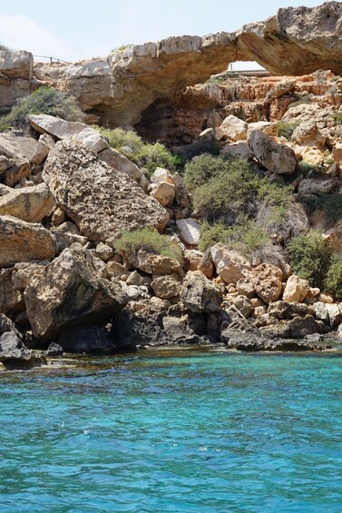 A rocky coastline with clear turquoise water. 2