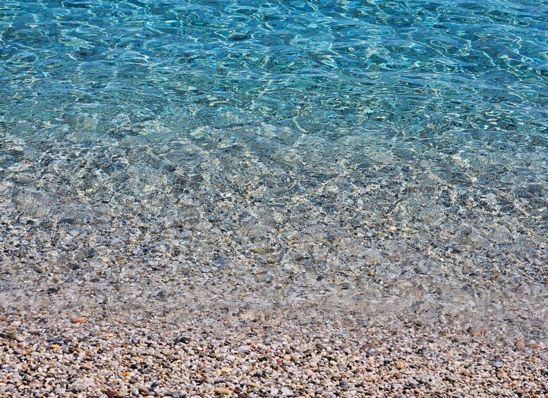 A clear shallow water body with a pebbly bottom. 3