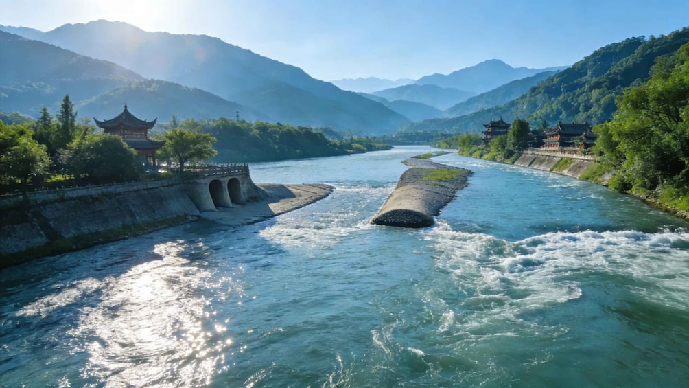 A river with a bridge, traditional architecture, and mountains in the background. 4