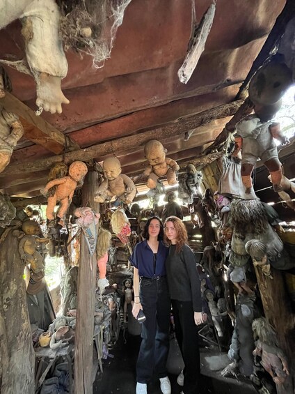A room filled with various sculptures and figures. 3