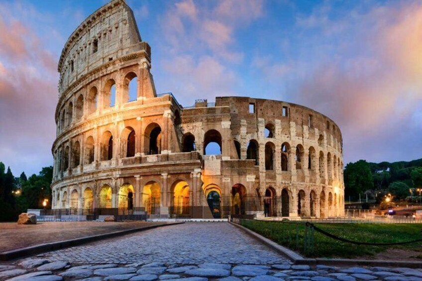 The Colosseum in Rome, Italy, with its iconic arches and ancient structure. 1
