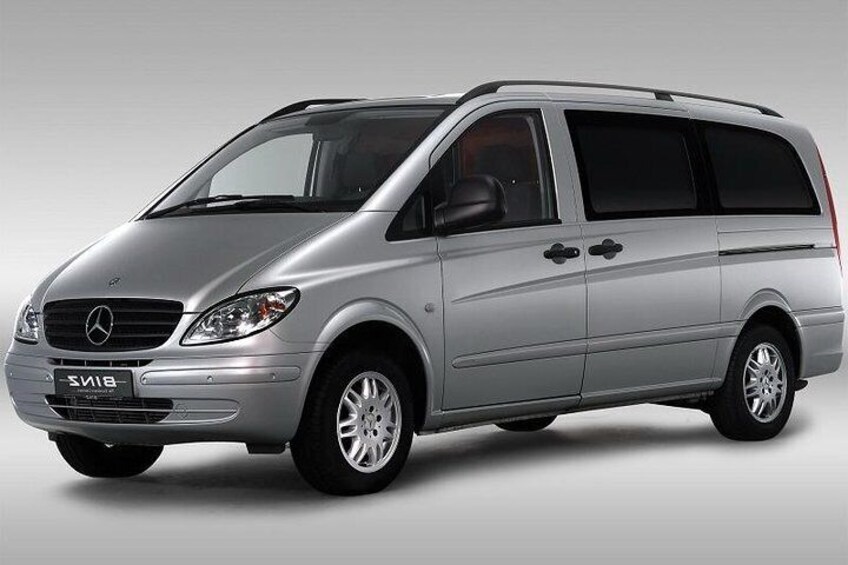 A silver Mercedes-Benz SWB van with alloy wheels, a sunroof, and a visible license plate. 1