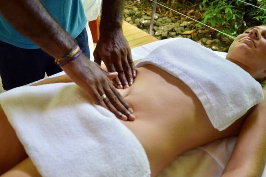 A person receiving a back massage. 3