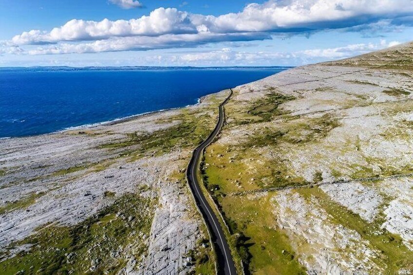 A winding road along a coastal cliff. 3