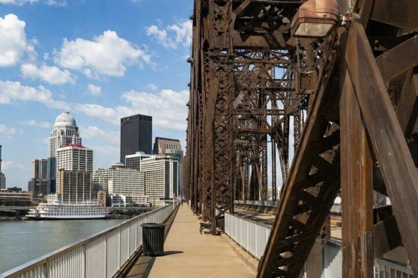 A bridge with a city skyline in the background. 2