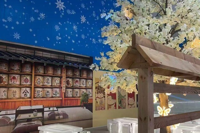 A traditional Japanese restaurant with tatami mats, a wooden structure, and cherry blossoms. 4