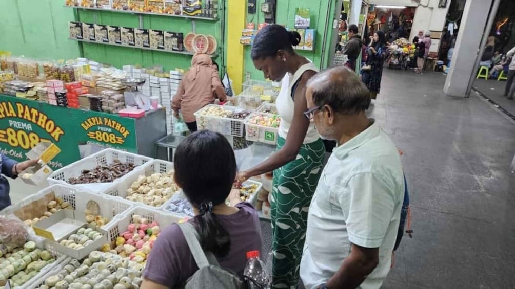 A market with various food items on display, including fruits and vegetables. 5