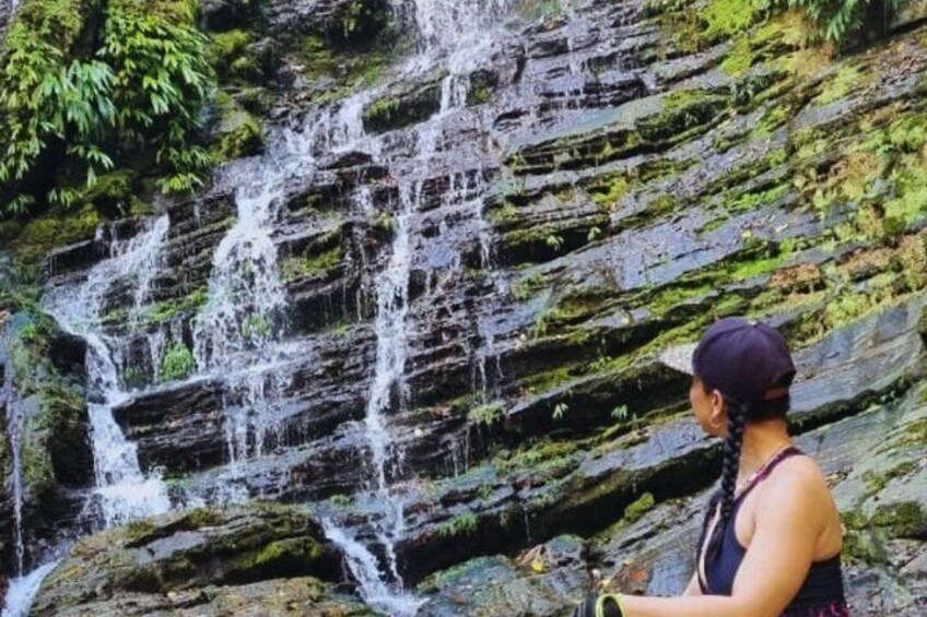 A waterfall cascading over a rocky cliff. 3