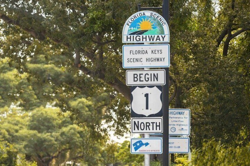 A Florida Scenic Highway sign with a route marker for Florida Keys Scenic Highway, indicating the beginning of Route 1 North. 2