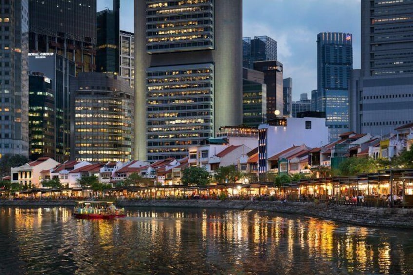 A waterfront cityscape with modern buildings and traditional architecture reflecting on the water. 1