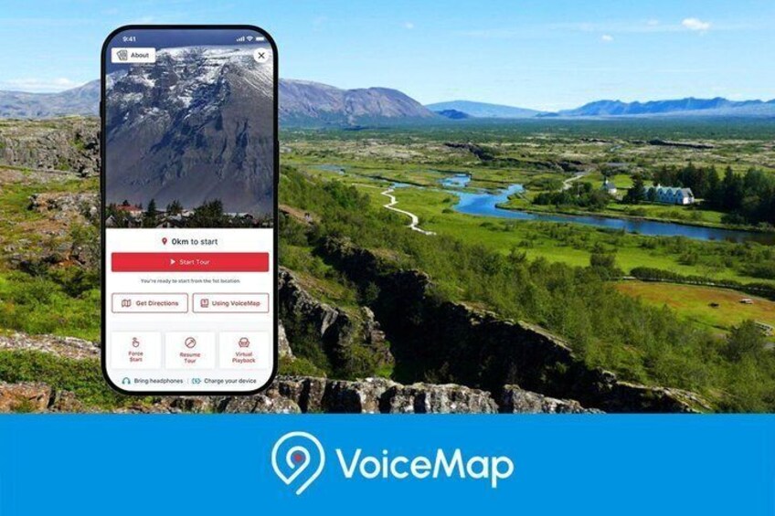 A smartphone displaying a scenic landscape with mountains, a river, and a lake. 4