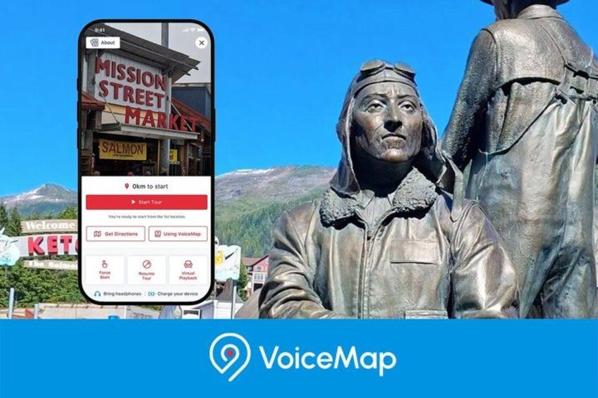 A smartphone displaying a map application with a statue in the background. 1