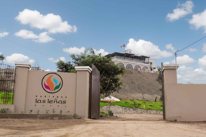 A gated entrance with a logo and the name 'Las Lenas'. 2