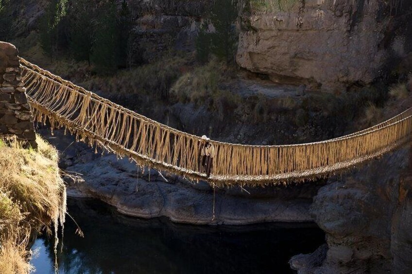 A rope bridge over a rocky gorge. 3