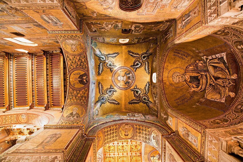 A richly decorated interior with intricate mosaics and ornate architectural details. 2