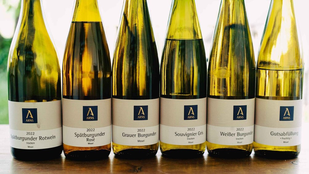 Six bottles of wine with labels indicating they are from 2022. 4