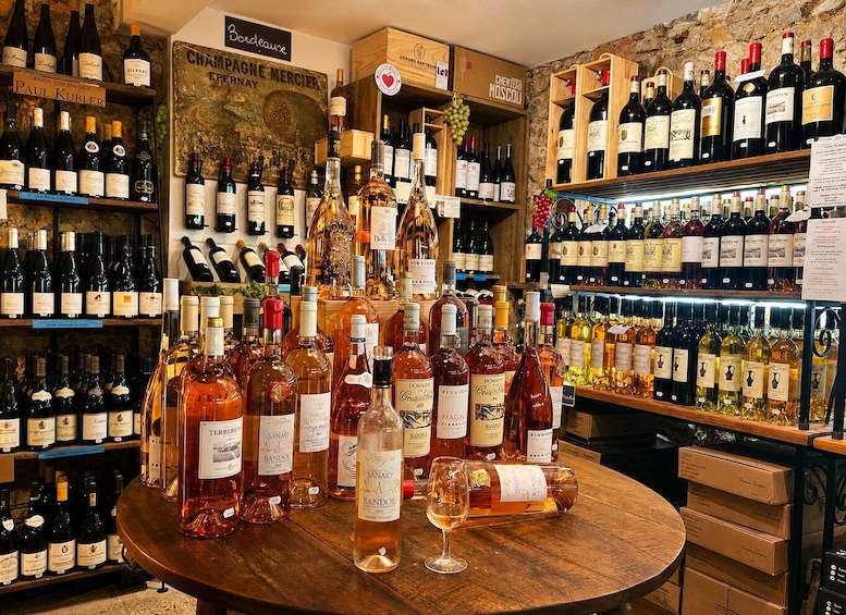 A wine cellar with various bottles of wine and spirits. 4