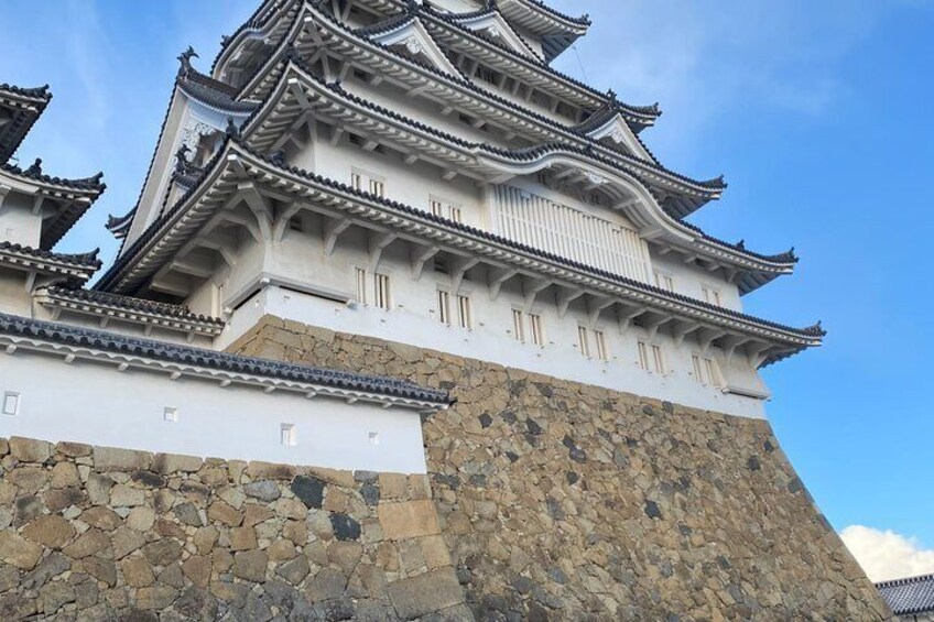 A traditional Japanese castle with multiple tiers and ornate roofs. 1