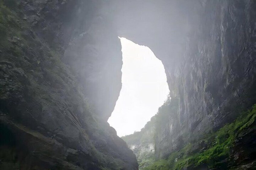 A cave opening with a natural archway. 3