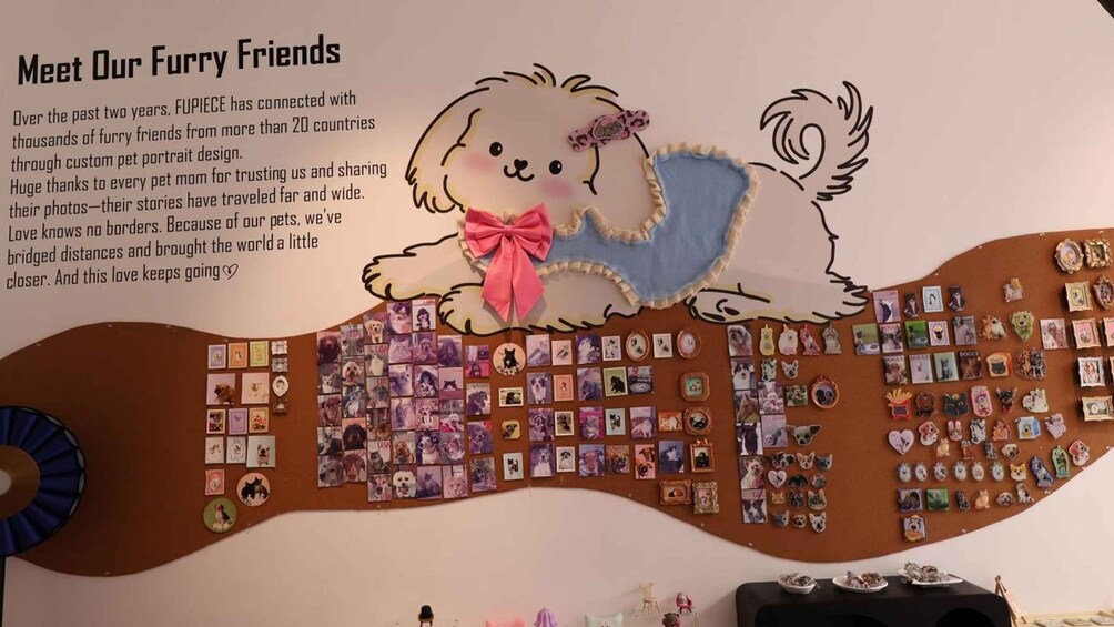 A wall with a large illustration of a dog and a collage of pet photos. 5