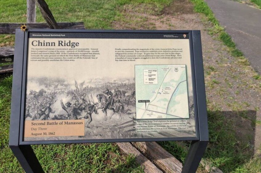 A historical marker at Chinn Ridge detailing the Second Battle of Manassas, including a map and a photograph of the battle. 5