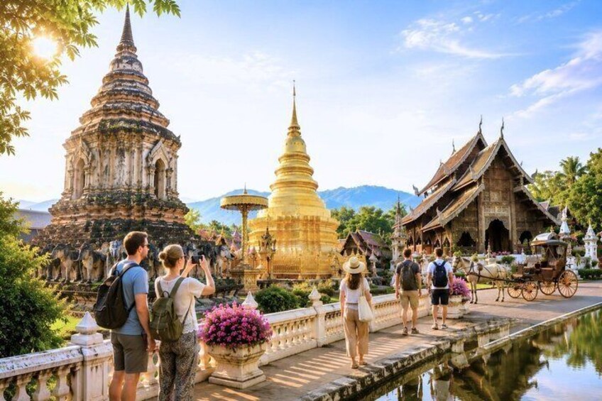 A temple complex with multiple structures, including a large golden stupa and a traditional wooden building. 1